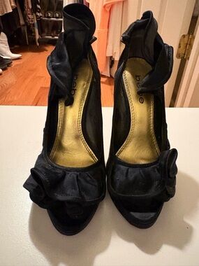 bebe Black Ruffle Peep-Toe Stiletto Heels with Gold Insole